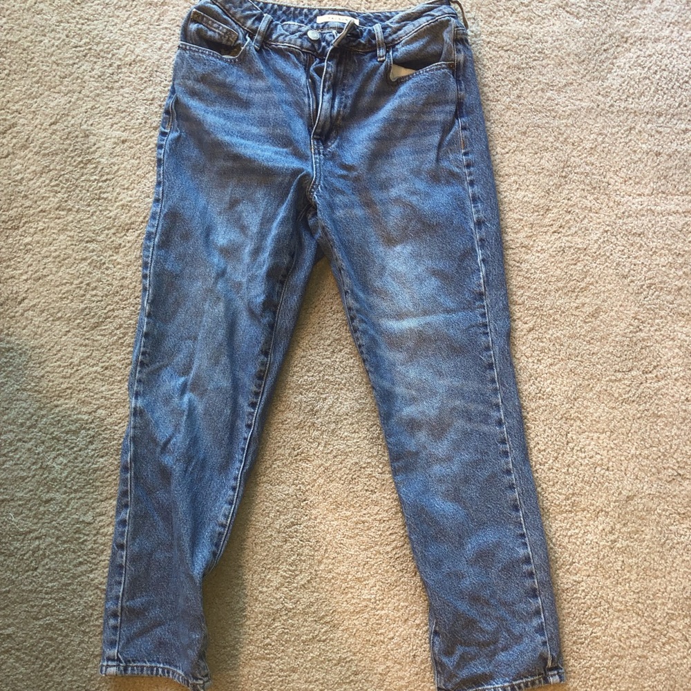 Once worn blue jeans